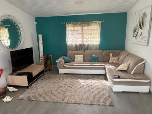 Posezení v ubytování Chambre zen & bien-être à 5 mn de la Galléria