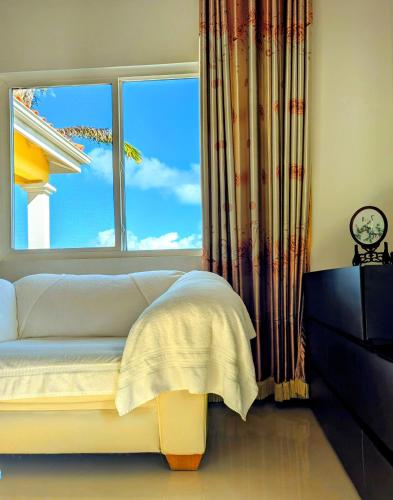 Katil atau katil-katil dalam bilik di Sun Wind Villa