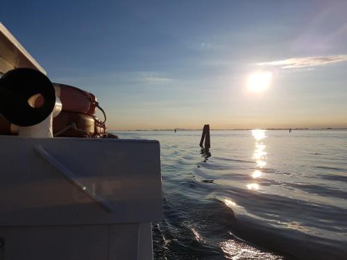 a view of the ocean from the back of a boat at Hotel Villa Orio & Beatrice in Venice-Lido