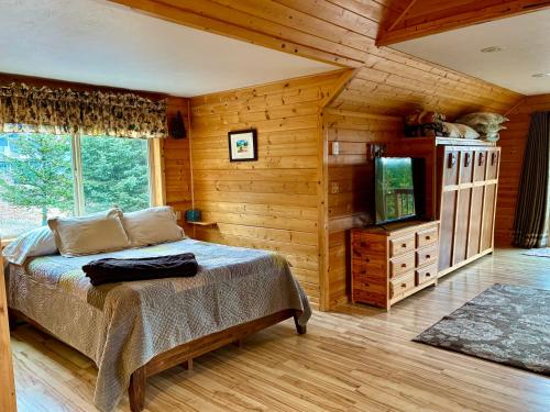 Postel nebo postele na pokoji v ubytování Cozy Cove Inn