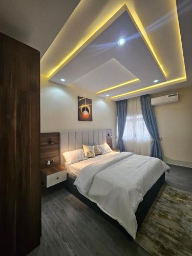 Ένα ή περισσότερα κρεβάτια σε δωμάτιο στο TTA Apartments