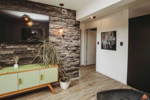 Un televizor și/sau centru de divertisment la City Living Unit 2 - 5 min stroll to CBD