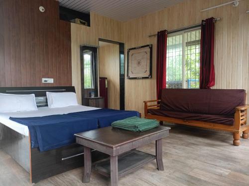 Ένα ή περισσότερα κρεβάτια σε δωμάτιο στο Bima Farm