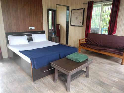 Ένα ή περισσότερα κρεβάτια σε δωμάτιο στο Bima Farm