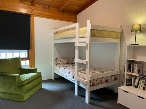 Ένα ή περισσότερα κρεβάτια σε δωμάτιο στο High Country Lodge