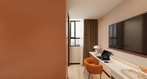 TV a/nebo společenská místnost v ubytování Hotel 165 - Newly Renovated