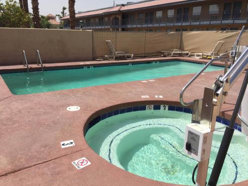 a swimming pool at a hotel at Days Inn by Wyndham Yuma in Yuma