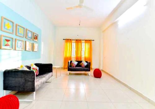 Et opholdsområde på Hotel O CLASSIC STAY