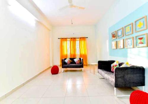 Et opholdsområde på Hotel O CLASSIC STAY