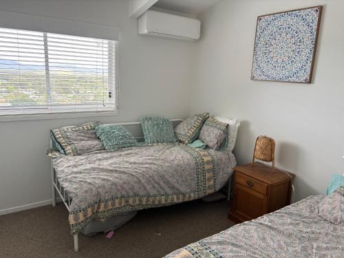 Ένα ή περισσότερα κρεβάτια σε δωμάτιο στο House with great views and interesting areas