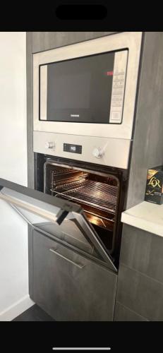 Η κουζίνα ή μικρή κουζίνα στο Duplex moderne et spacieux 6 couchages