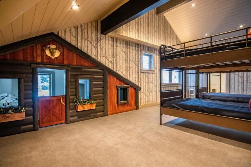 a bedroom with a bunk bed in a house at RMR: Sublette Ridge Ski Lodge in Teton Village in Teton Village