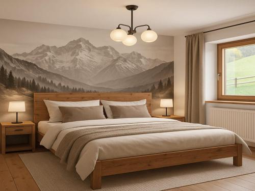 a bedroom with a large bed with a mountain mural at Holiday home with panoramic view in Kleinvolderberg