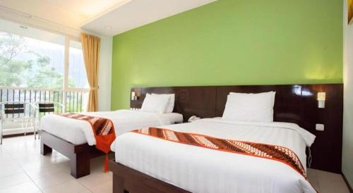 Una cama o camas en una habitación de Casa Monte Rosa