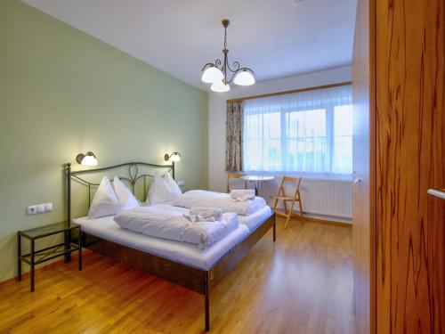 Ένα ή περισσότερα κρεβάτια σε δωμάτιο στο Vicky Apartment Wildschönau with balcony, cleaning included