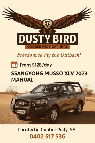 a flyer for a car dealership with an eagle on it at Desert Gum Grund st in Coober Pedy