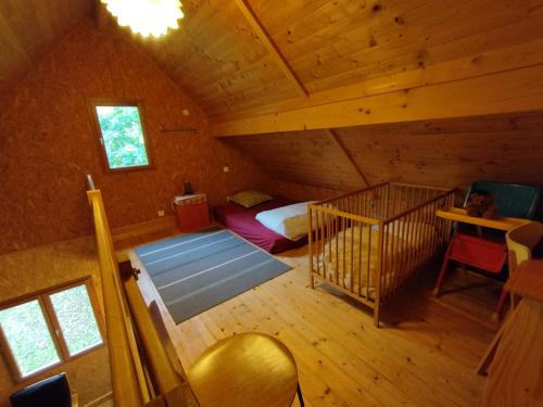 Postel nebo postele na pokoji v ubytování Gîte Chalet Morvan Bourgogne