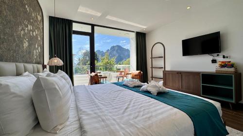 Postel nebo postele na pokoji v ubytování Sunrise Mountain View Resort