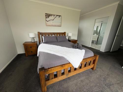 Ένα ή περισσότερα κρεβάτια σε δωμάτιο στο Cozy Crescent