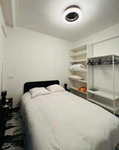 Ένα ή περισσότερα κρεβάτια σε δωμάτιο στο Charming 1 bedroom with terrace