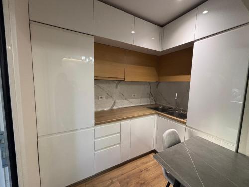 Kuchyň nebo kuchyňský kout v ubytování Suite Home