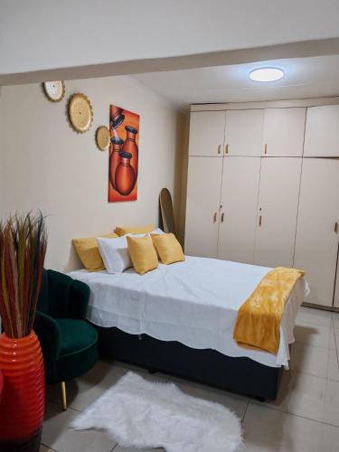 Ένα ή περισσότερα κρεβάτια σε δωμάτιο στο Sunset Inn