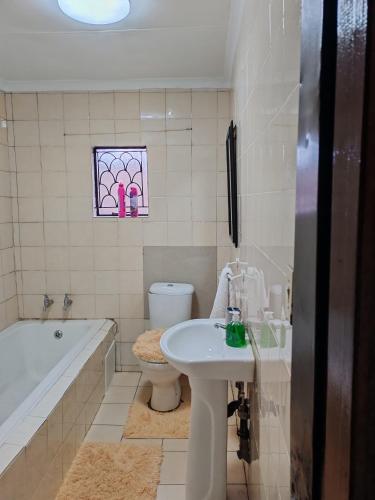 Ένα μπάνιο στο Sunset Inn