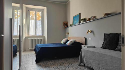 Ένα ή περισσότερα κρεβάτια σε δωμάτιο στο Antica Dimora Dialetto