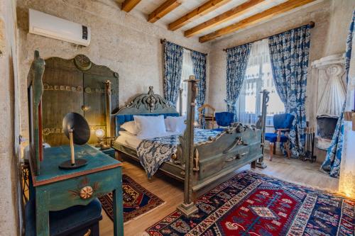 Ένα ή περισσότερα κρεβάτια σε δωμάτιο στο Eyes Of Cappadocia Cave Hotel