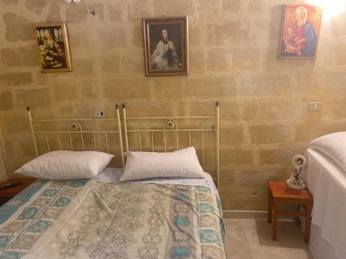 Postel nebo postele na pokoji v ubytování Central Matera 366-1968-378