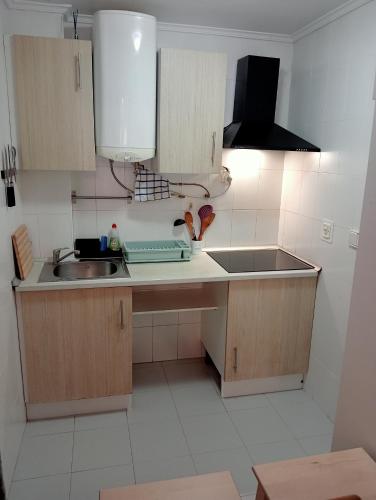 a kitchen with a sink and a counter top at Ajo surf house in Ajo