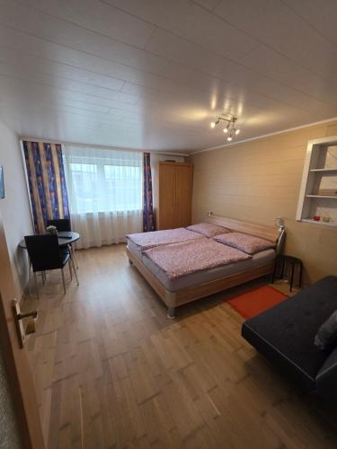 Postel nebo postele na pokoji v ubytování Ferienwohnung Nagy