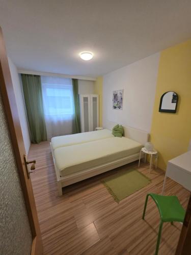 Ένα ή περισσότερα κρεβάτια σε δωμάτιο στο Ferienwohnung Nagy