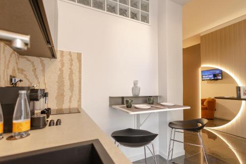 Kuchyň nebo kuchyňský kout v ubytování VBM SUITE & SPA Apartments