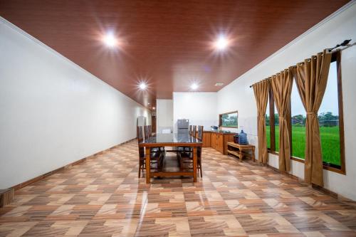 TV a/nebo společenská místnost v ubytování Homestay Impian Bantul Yogyakarta