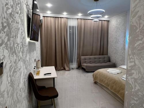 En eller flere senge i et værelse på Lion Vip Hotel