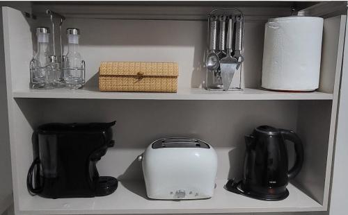 Kuchyň nebo kuchyňský kout v ubytování MG Boho Apartment