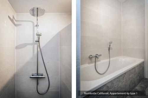 a bathroom with a shower and a bath tub at Residentie Californië in De Koog