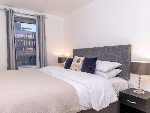 Voodi või voodid majutusasutuse The Sycamore Suite toas