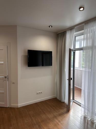 Μια τηλεόραση ή/και κέντρο ψυχαγωγίας στο Апартаменти ЖК "Сонячний Квартал"