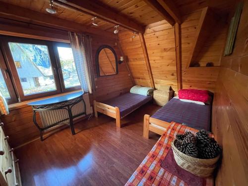 Posezení v ubytování Domek w Lesie