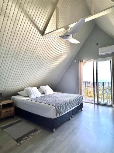 Llit o llits en una habitació de Villa Morin