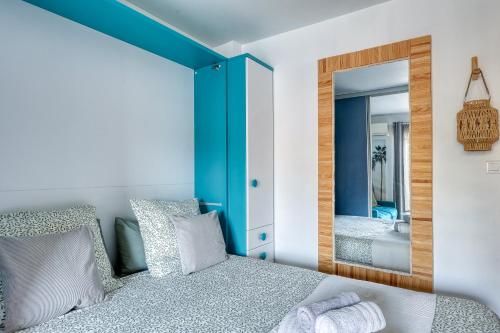 Postel nebo postele na pokoji v ubytování Escapade à Bandol balcon verdoyant et plage à deux pas