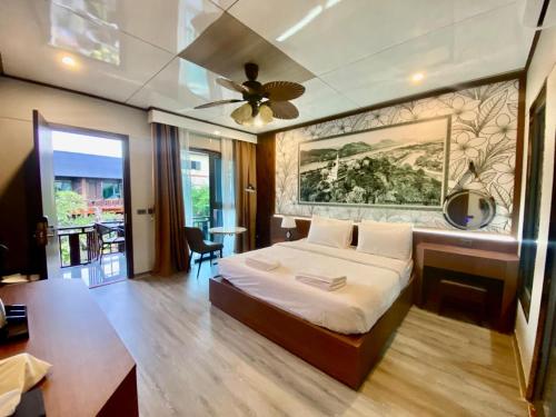 Postel nebo postele na pokoji v ubytování Champa Phan Boutique Hotel