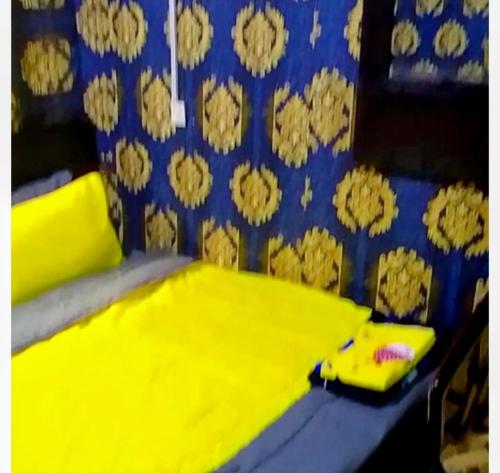 Ένα ή περισσότερα κρεβάτια σε δωμάτιο στο Short Let Apartments in Lagos Business School Lekki Ajah