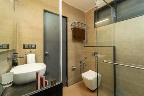 Koupelna v ubytování Dew Drops Jungle Resort