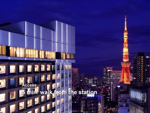 a view of the eiffel tower at night at Mitsui Garden Hotel Roppongi Tokyo Premier in Tokyo