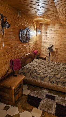 Ένα ή περισσότερα κρεβάτια σε δωμάτιο στο Sauna Cheremosh