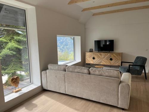 TV a/nebo společenská místnost v ubytování Appartement StPeter, 5 min met de auto van de skipistes