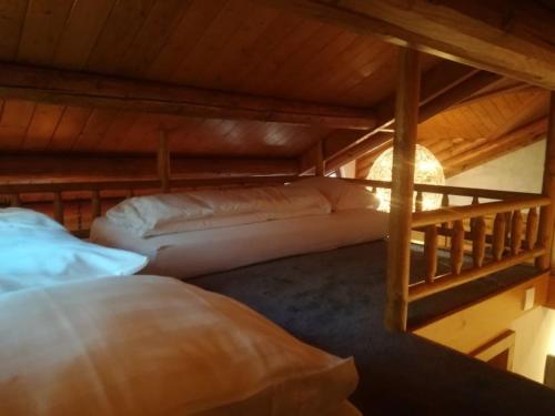 Postel nebo postele na pokoji v ubytování Lutterlodge